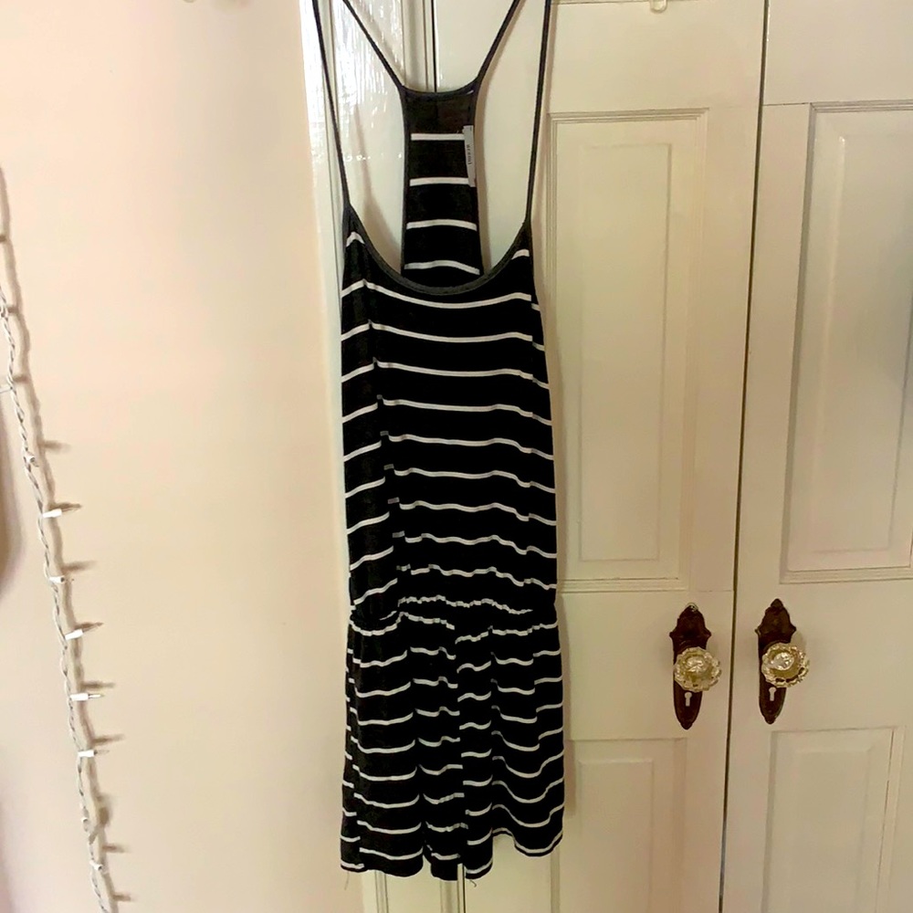 Grey and white romper, light fitting,